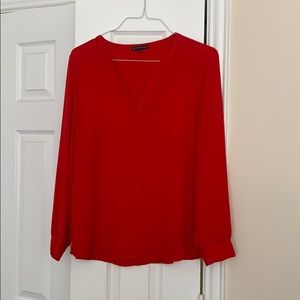 Red, long sleeved, v-neck blouse